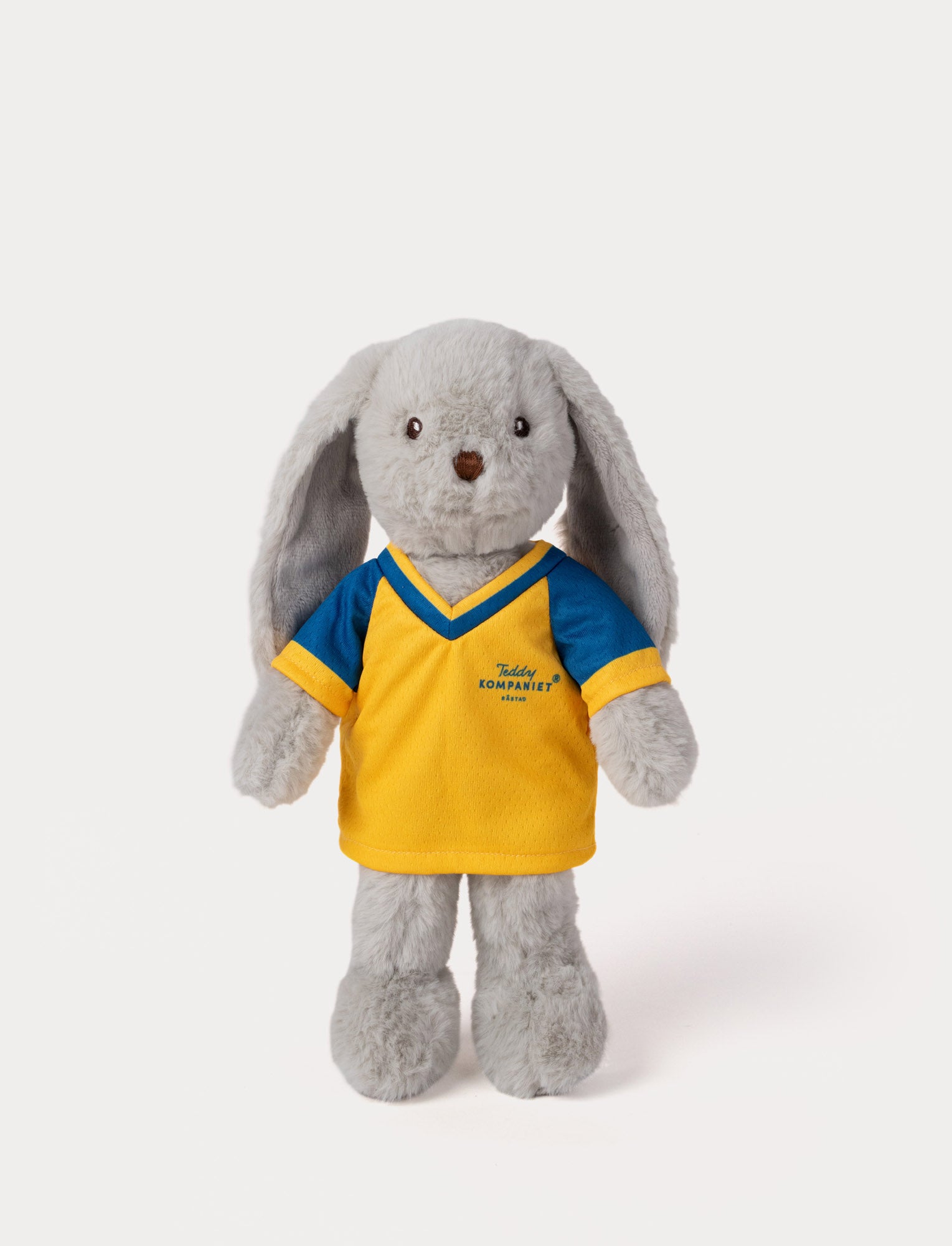  Image of Stuffed bunny toy wearing a yellow and blue football shirt 