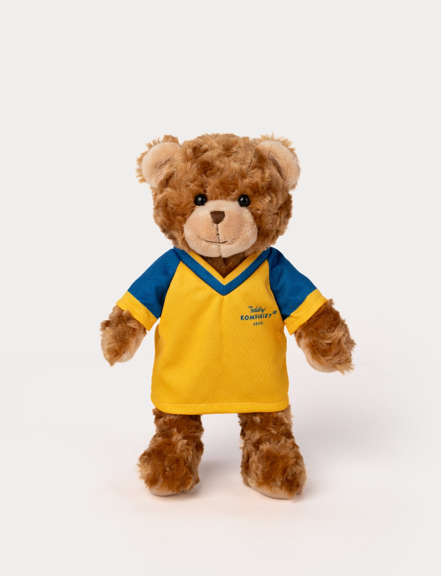 Stuffed teddy bear toy wearing a yellow and blue football shirt 