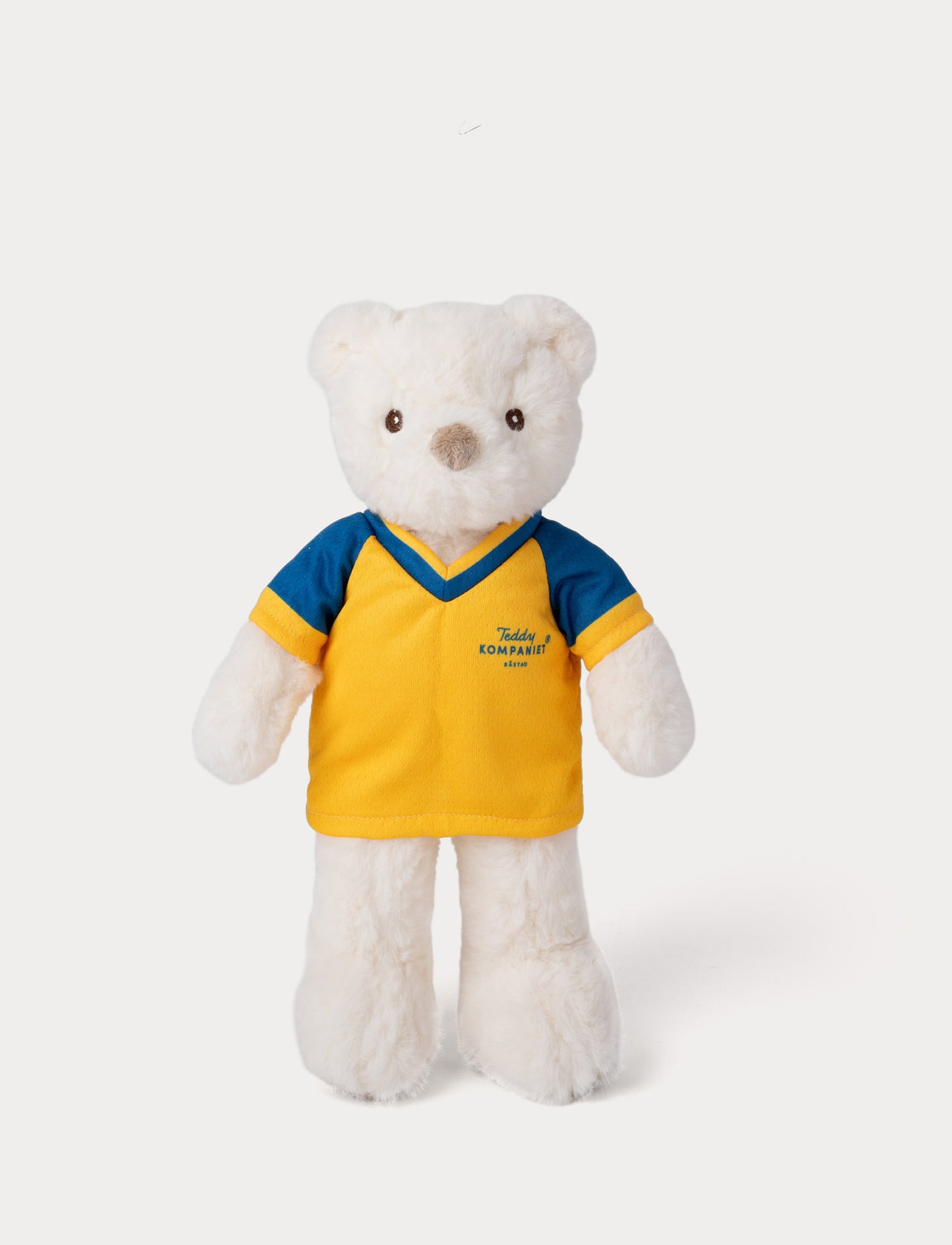 Stuffed teddy bear toy wearing a yellow and blue football shirt 