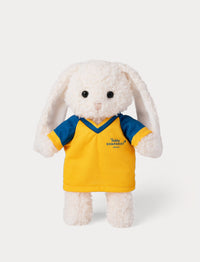 Stuffed bunny toy wearing a yellow and blue football shirt 