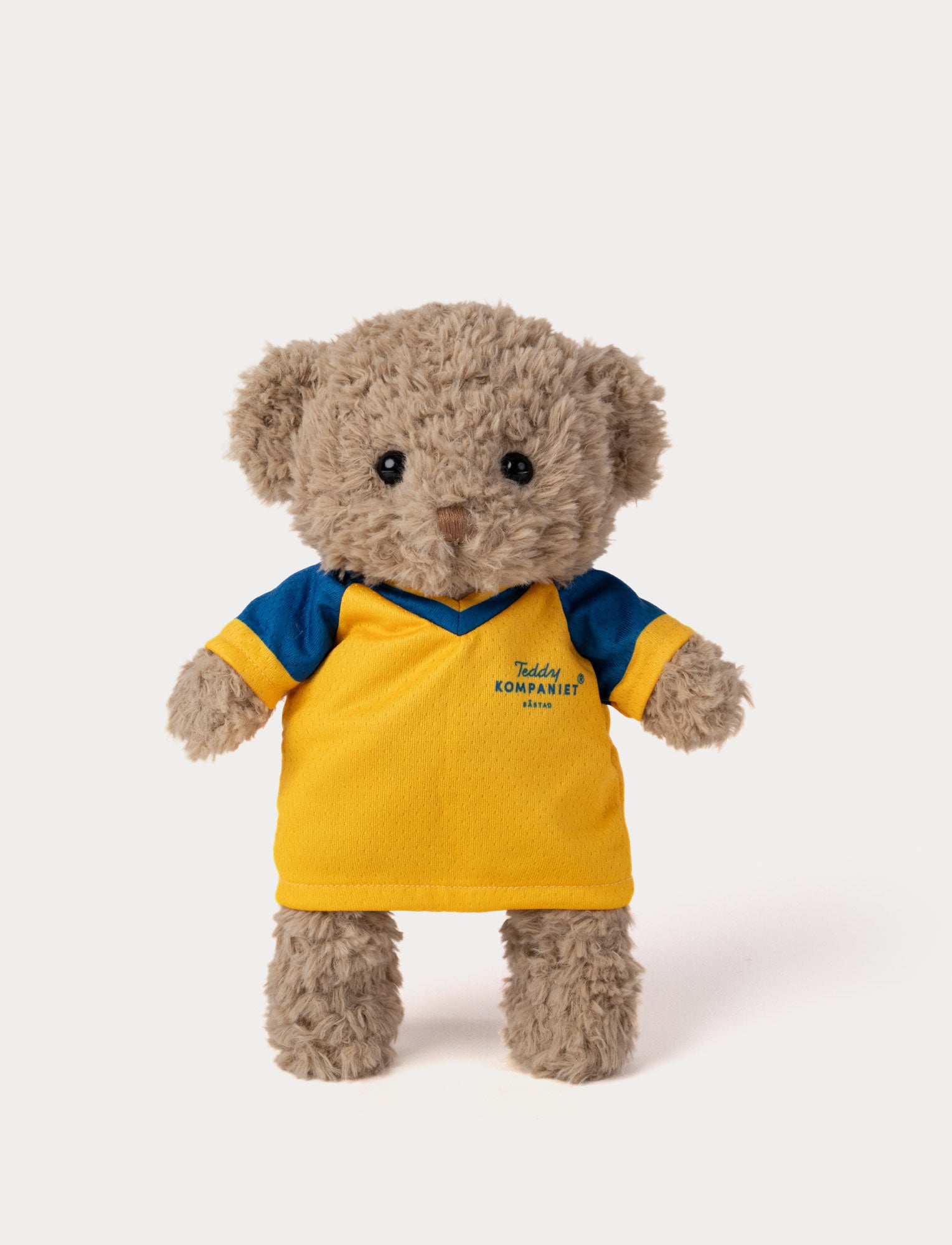  Image of Stuffed teddy bear toy wearing a yellow and blue football shirt 