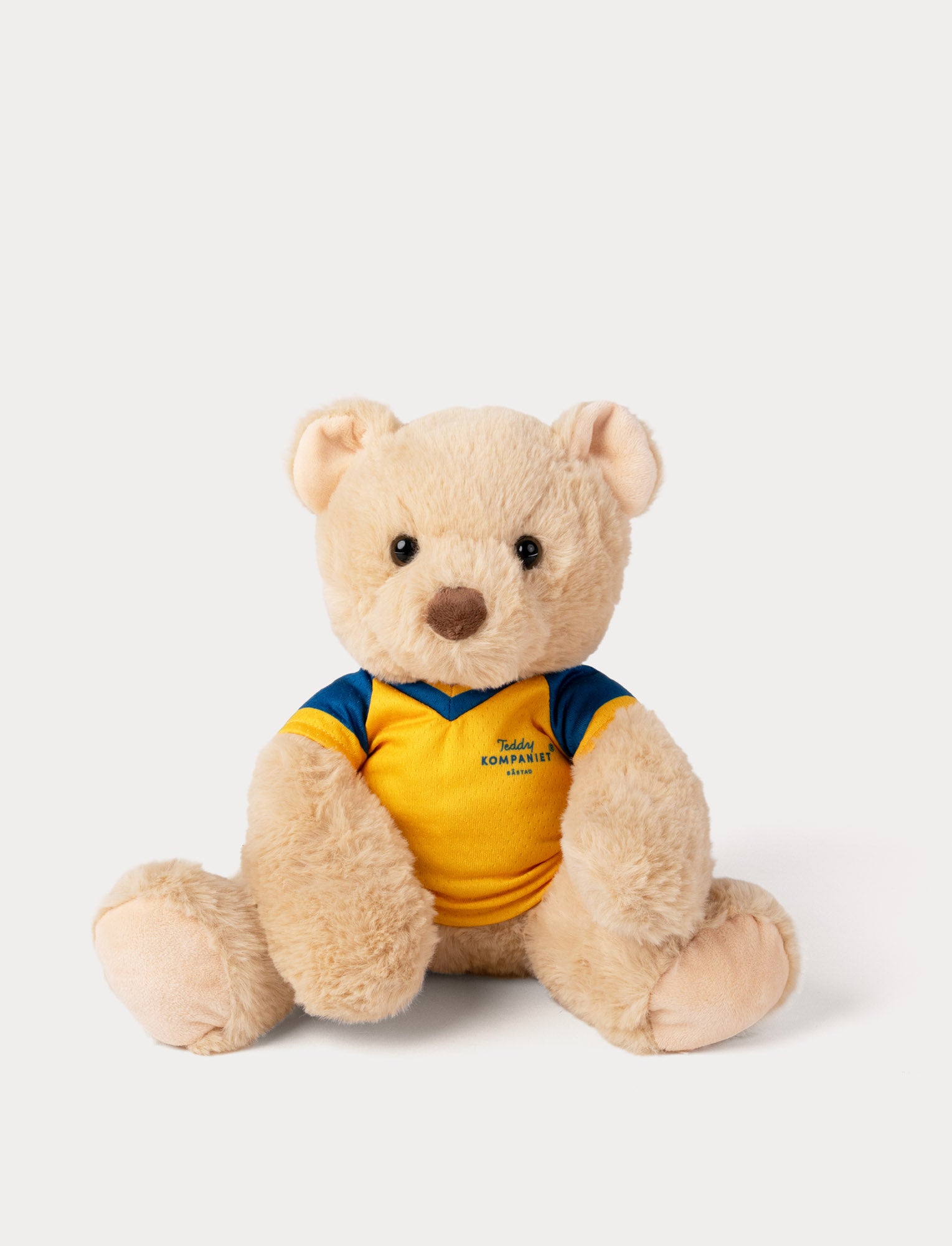  Image of Stuffed teddy bear toy wearing a yellow and blue football shirt 