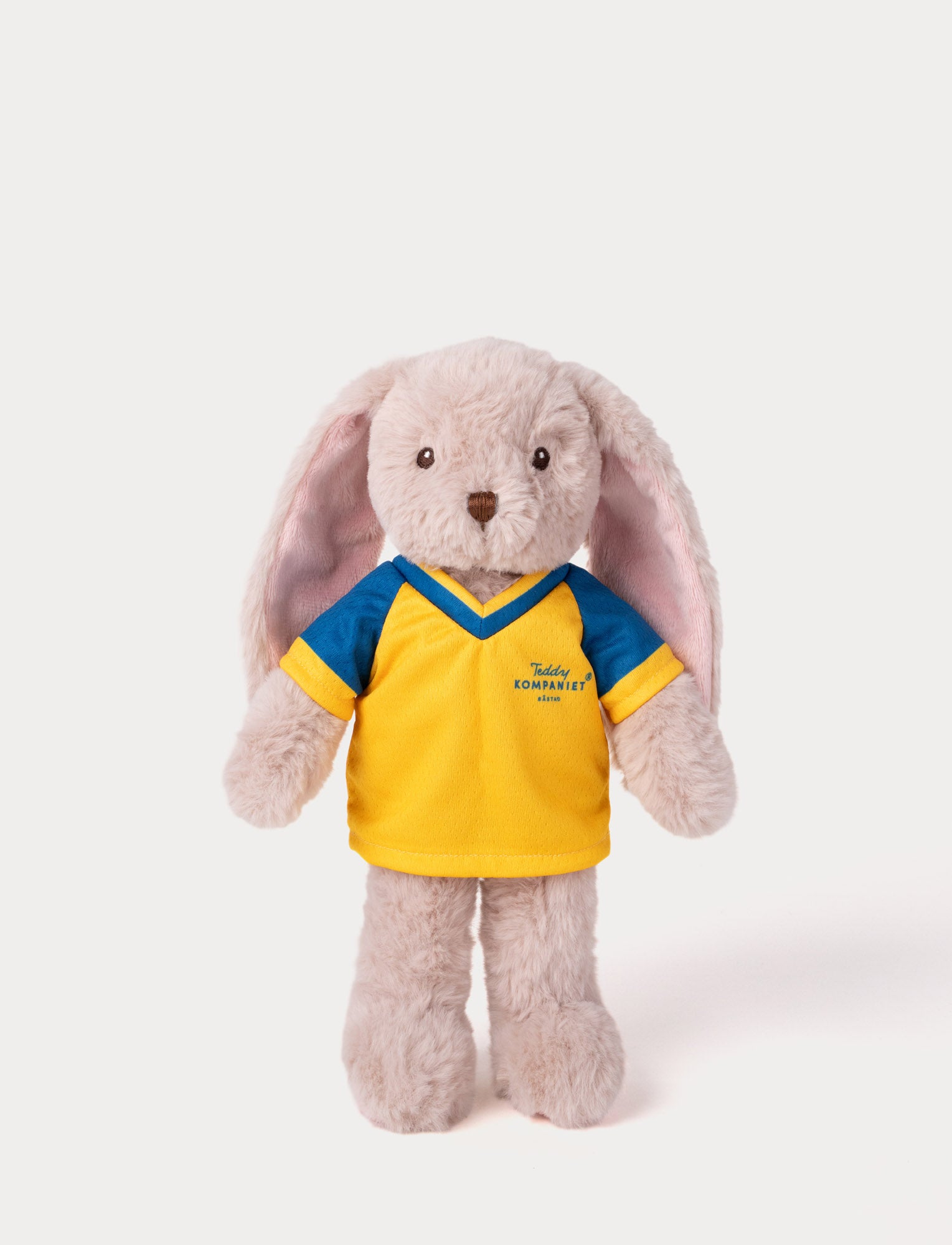  Image of Stuffed bunny toy wearing a yellow and blue football shirt 