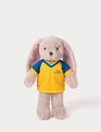 Stuffed bunny toy wearing a yellow and blue football shirt 