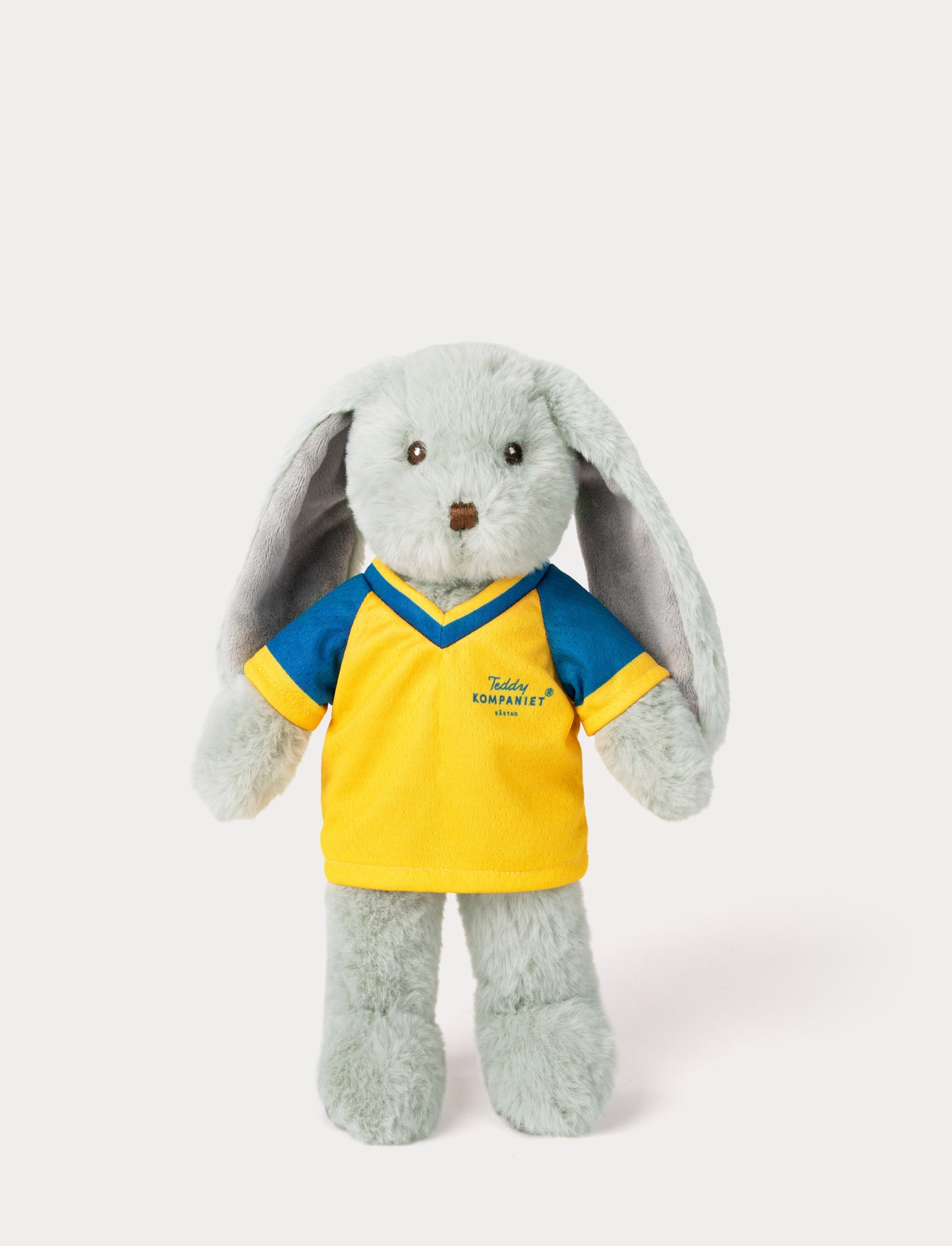 Stuffed bunny toy wearing a yellow and blue football shirt 