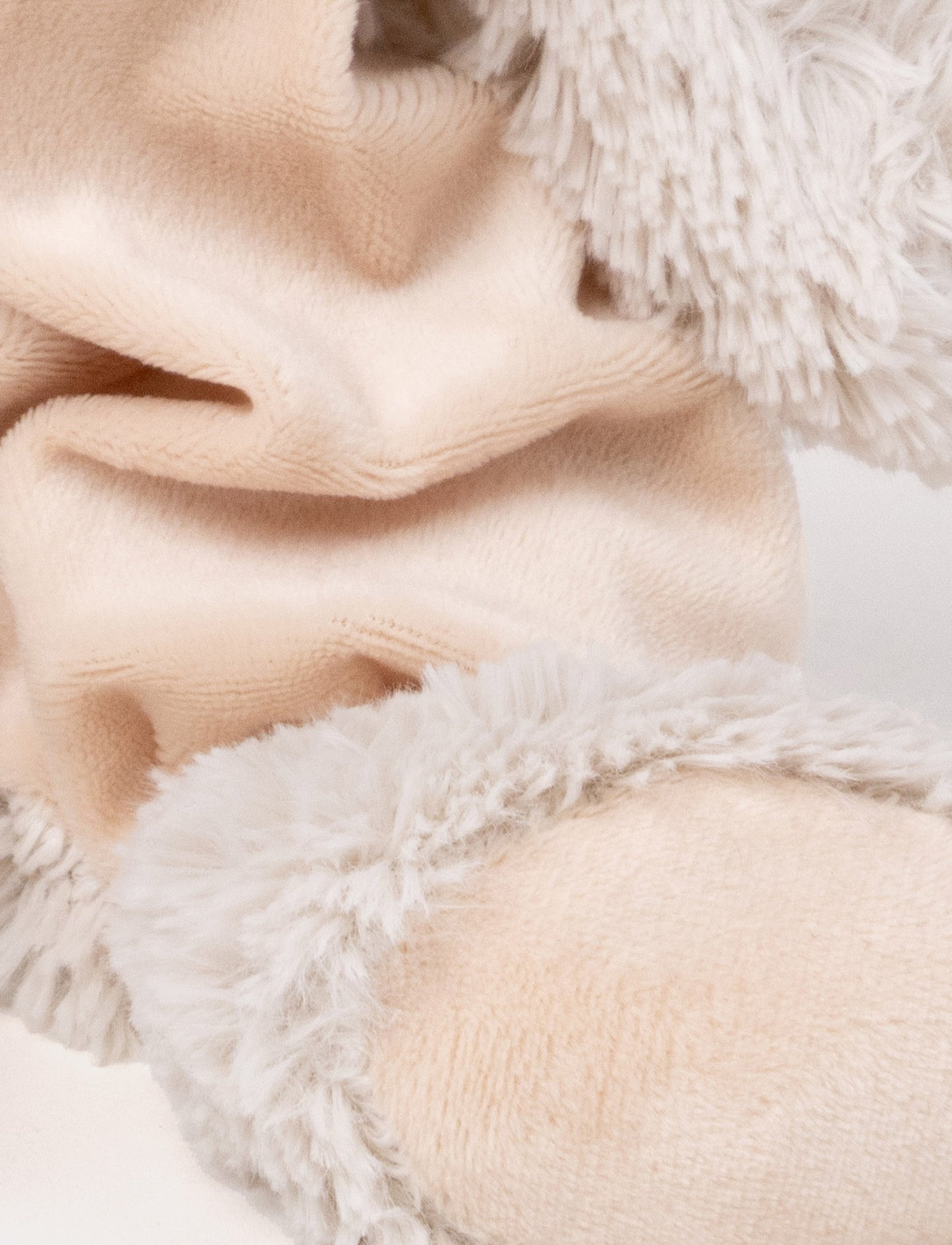 Soft baby blanket with a plush beige bunny head, floppy furry ears, and a cozy fabric body.
