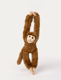 Brown plush monkey with long arms and a smiling face, designed to hang by its hands with Velcro.