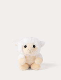 Small plush lamb toy on a white background