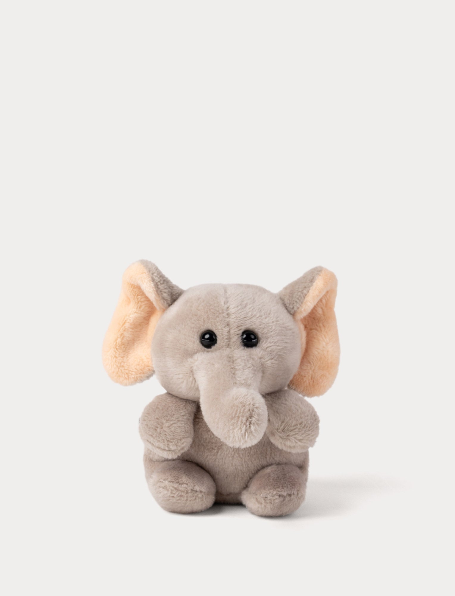  Image of Small Plush elephant toy on a light gray background