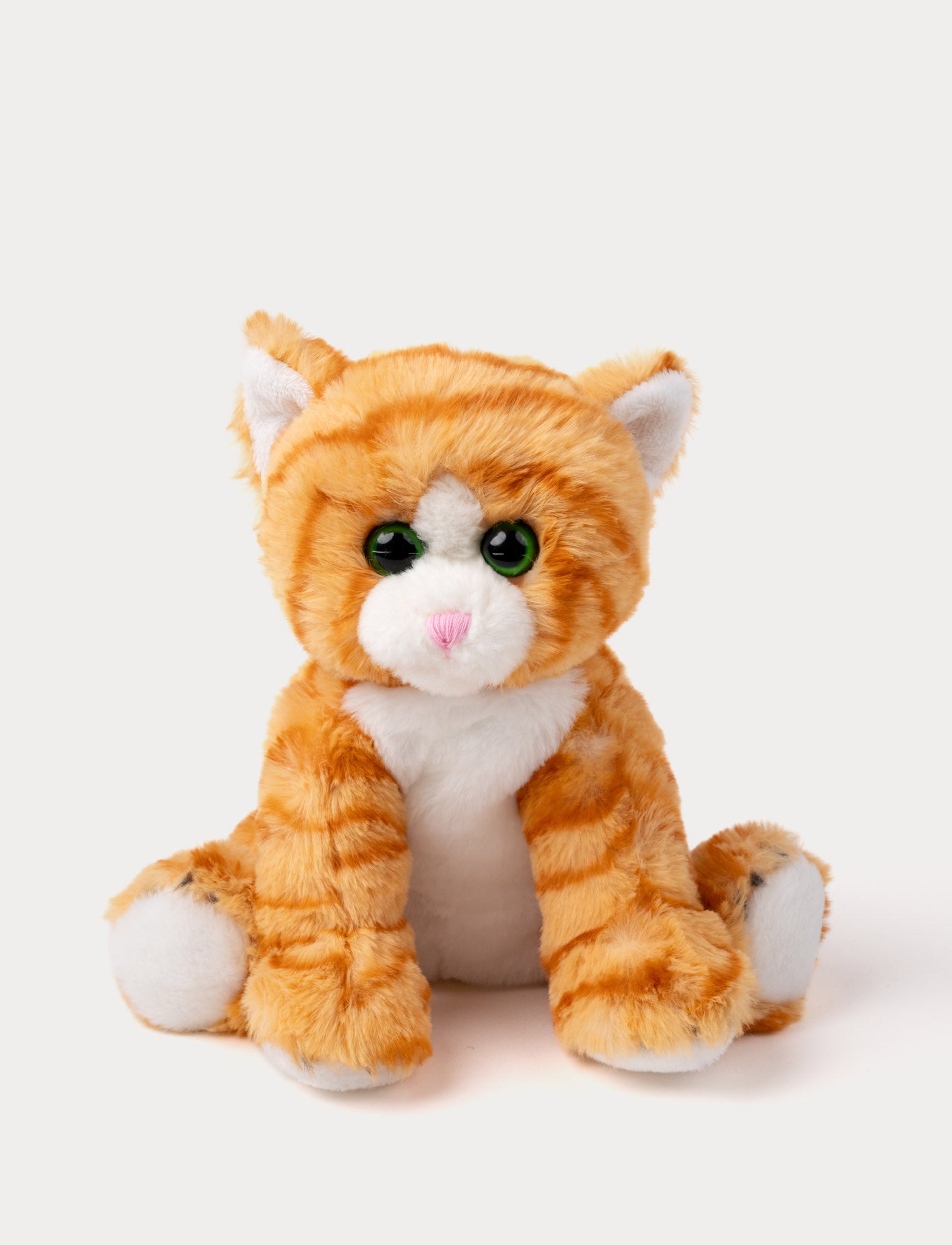  Image of Soft orange striped kitten plush with green eyes, a pink nose, and white paws.