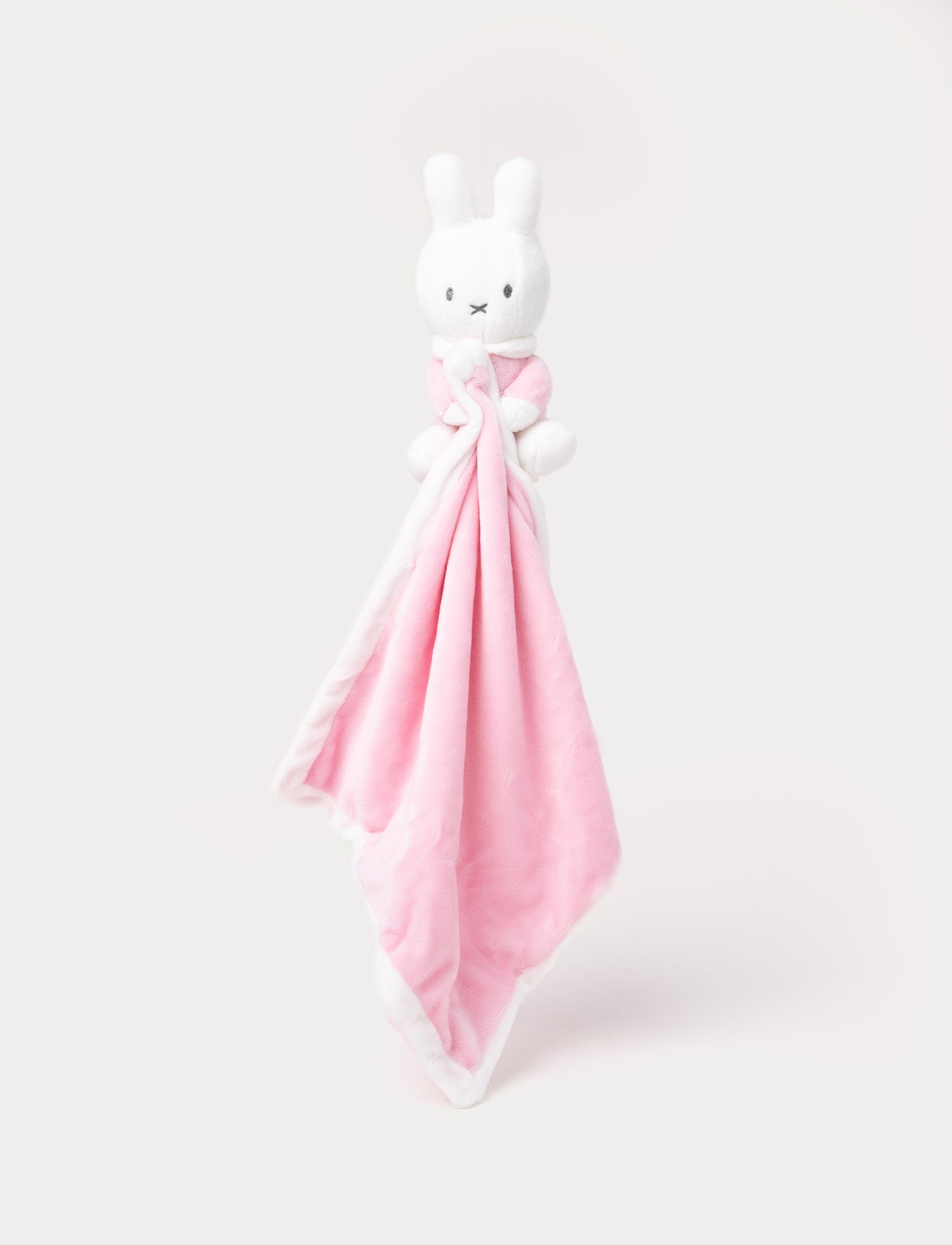  Image of Soft pink baby blanket with a Miffy bunny on top, featuring a simple and cozy design.