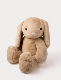 Soft beige plush bunny with long floppy ears, a pink nose, and a cuddly, fluffy texture.