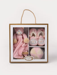 A Diinglisar gift box set featuring a pink plush cat comforter, matching slippers, and a soft toy ball.