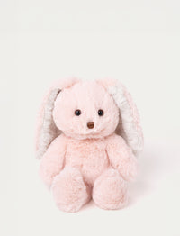 Soft pink plush bunny with long floppy ears, brown eyes, and a stitched brown nose.