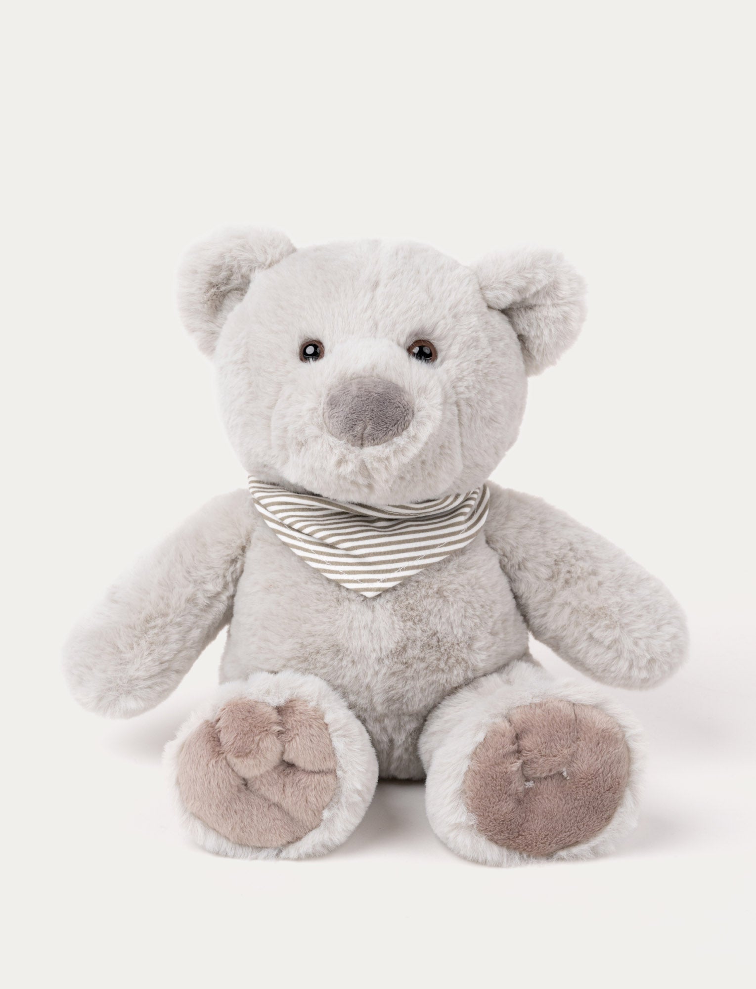  Image of Soft gray teddy bear with a plush nose, brown paws, and a striped gray and white scarf around its neck.