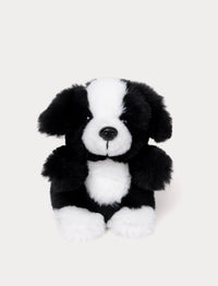 Black and white small plush dog