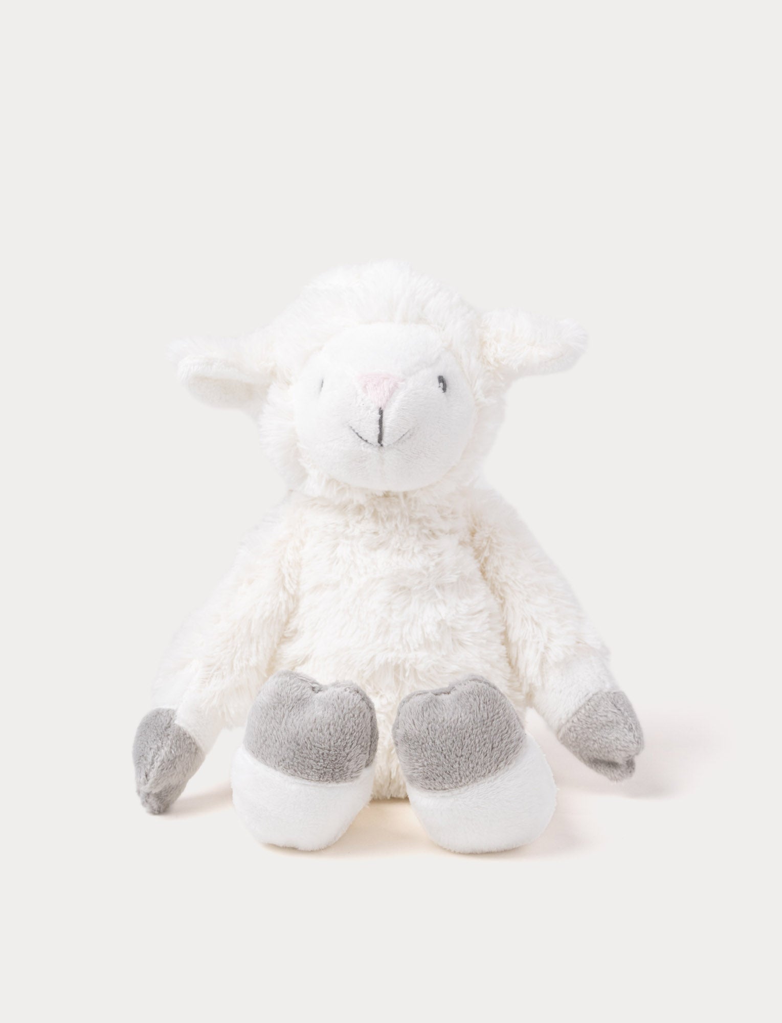  Image of Soft plush lamb with fluffy white fur, grey hooves, and a stitched smiling face.