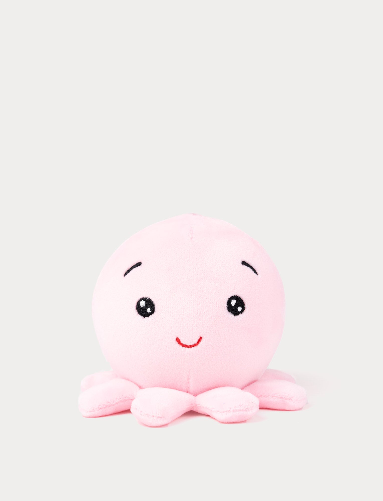  Image of Soft pink octopus plush toy with a cute smiling face