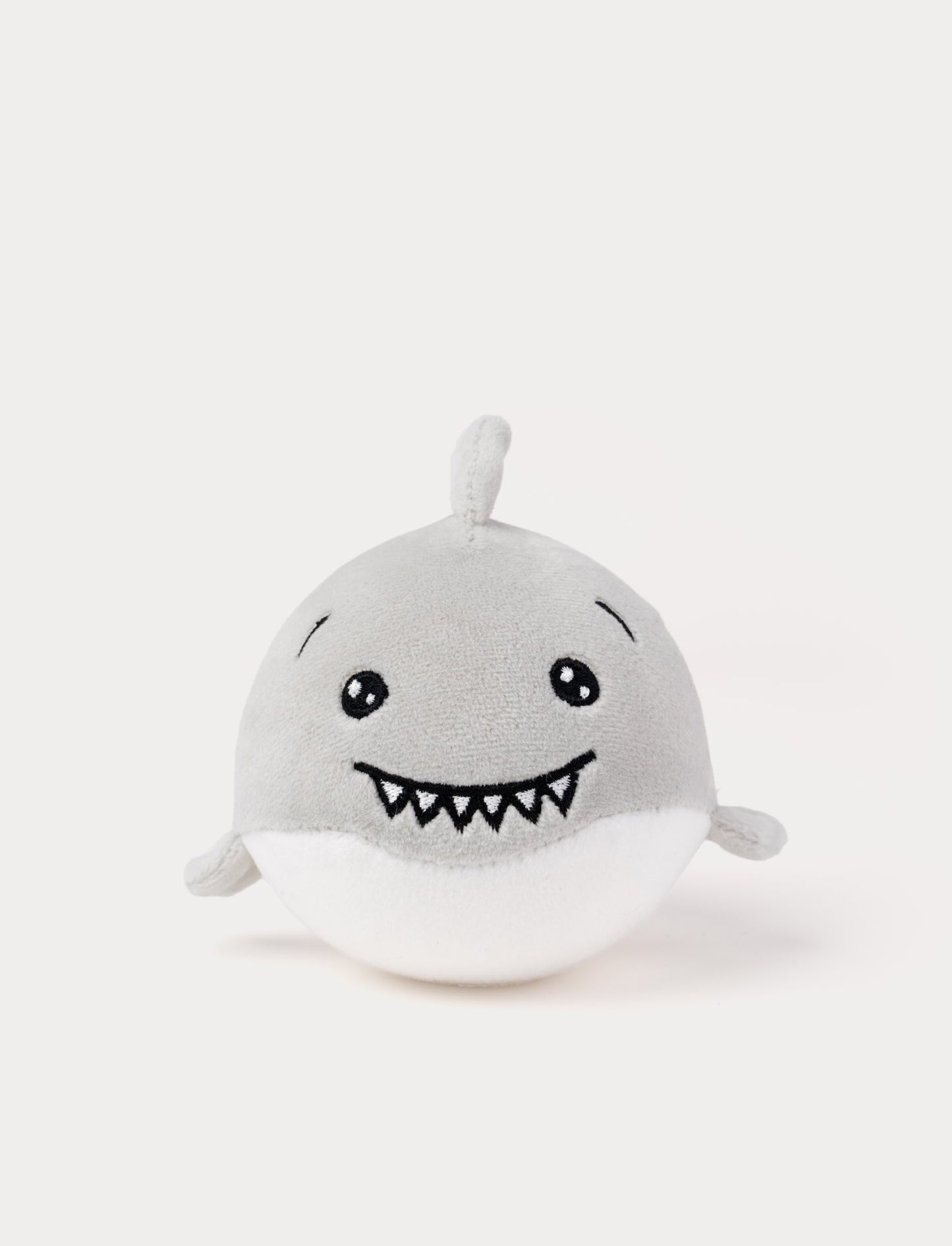 Soft grey shark plush toy with a smiling face and small fins