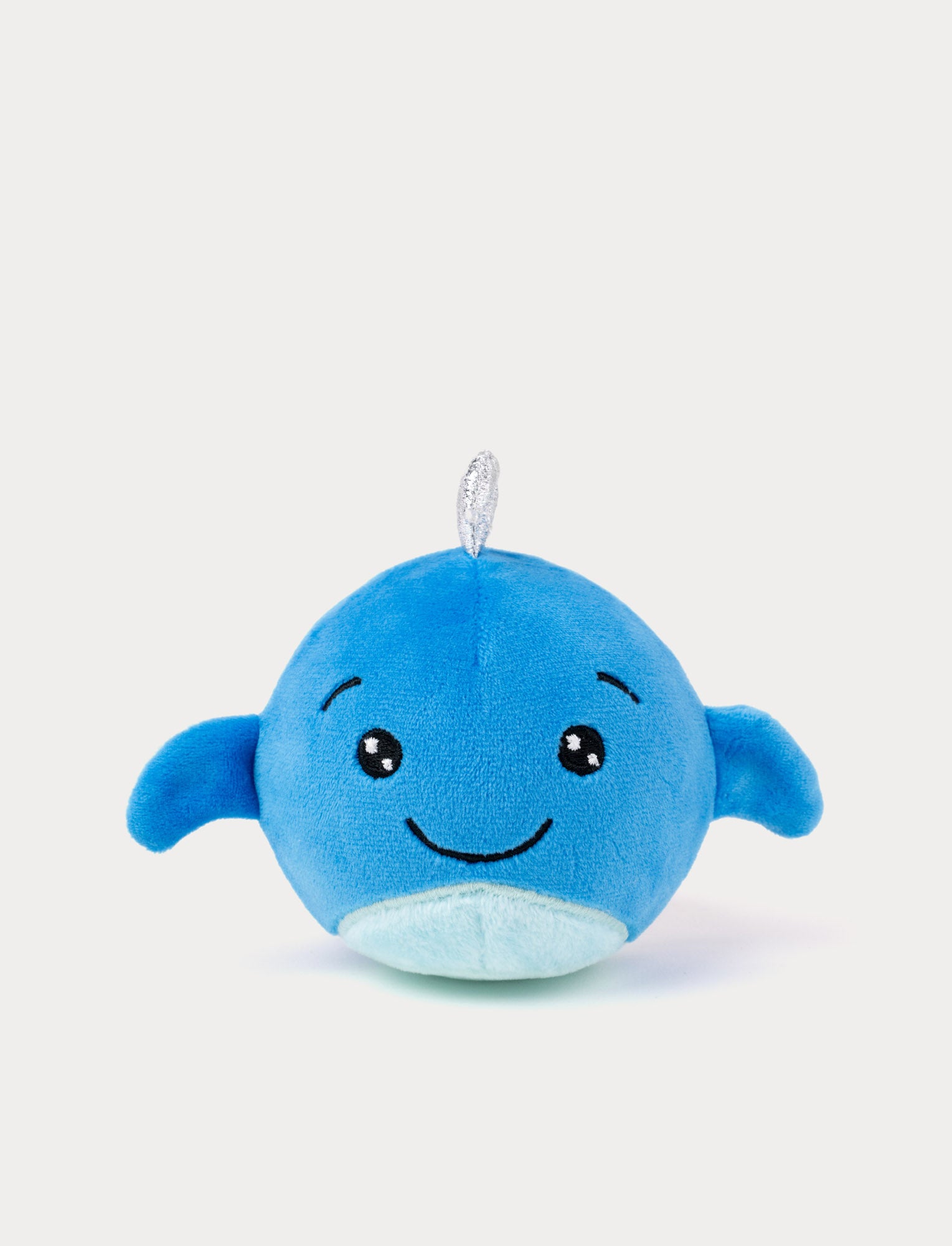  Image of Soft blue whale plush toy with a smiling face and silver spout on top
