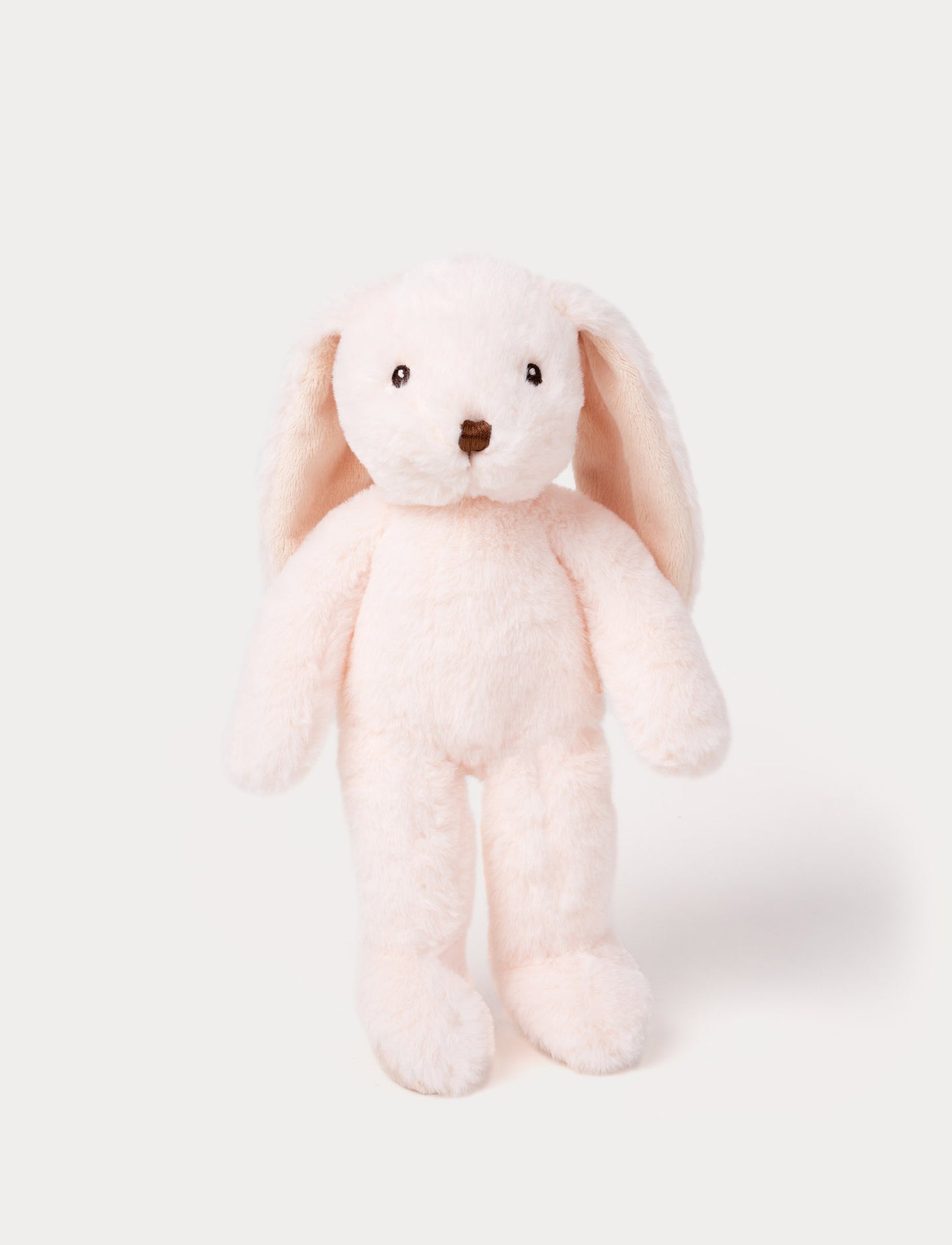 Soft, plush bunny with light pink fur, long floppy ears, black button eyes, and a small stitched nose.