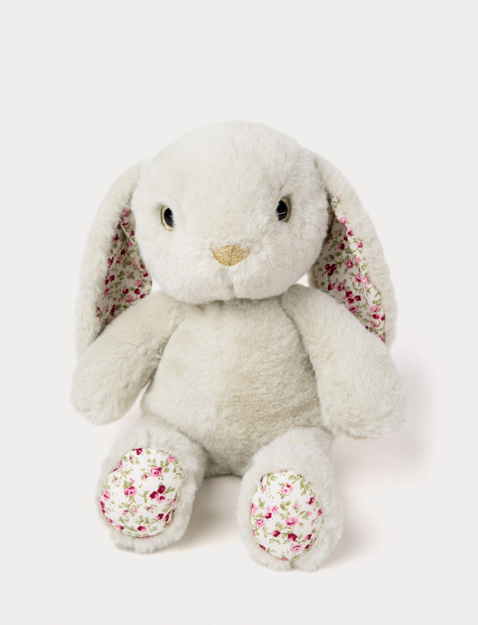  Image of Soft light green plush bunny with floral-patterned ears and paws, featuring a small stitched nose.