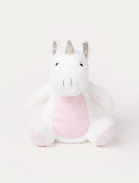 A unicorn with white plush fur, pink details, and the ability to glow in the dark.