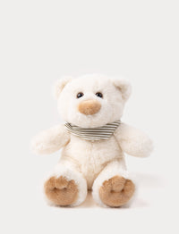 A teddy bear with cream-colored fur and a charming scarf, perfect for cuddling.