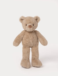 Beige plush teddy bear with long legs, round ears, and a soft brown nose.