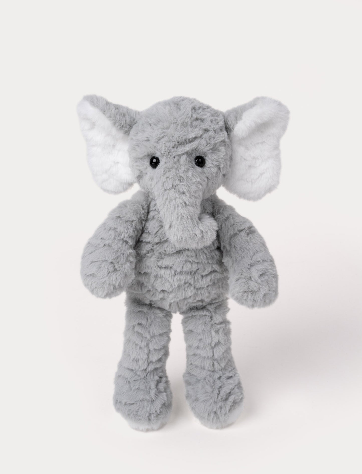 Grey plush elephant with large floppy ears, a long trunk, and a soft, textured body.