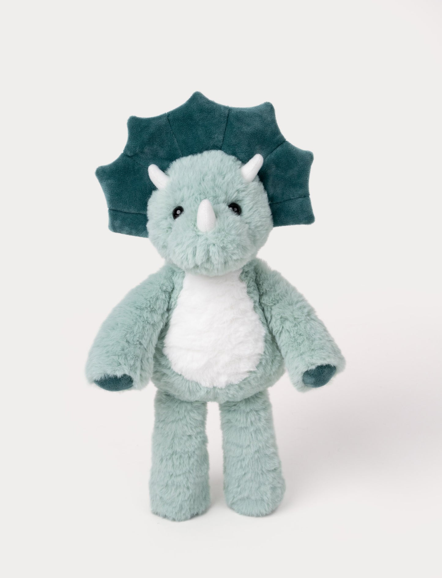Soft plush triceratops with light green fur, a white belly, dark green frill, and three small white horns.