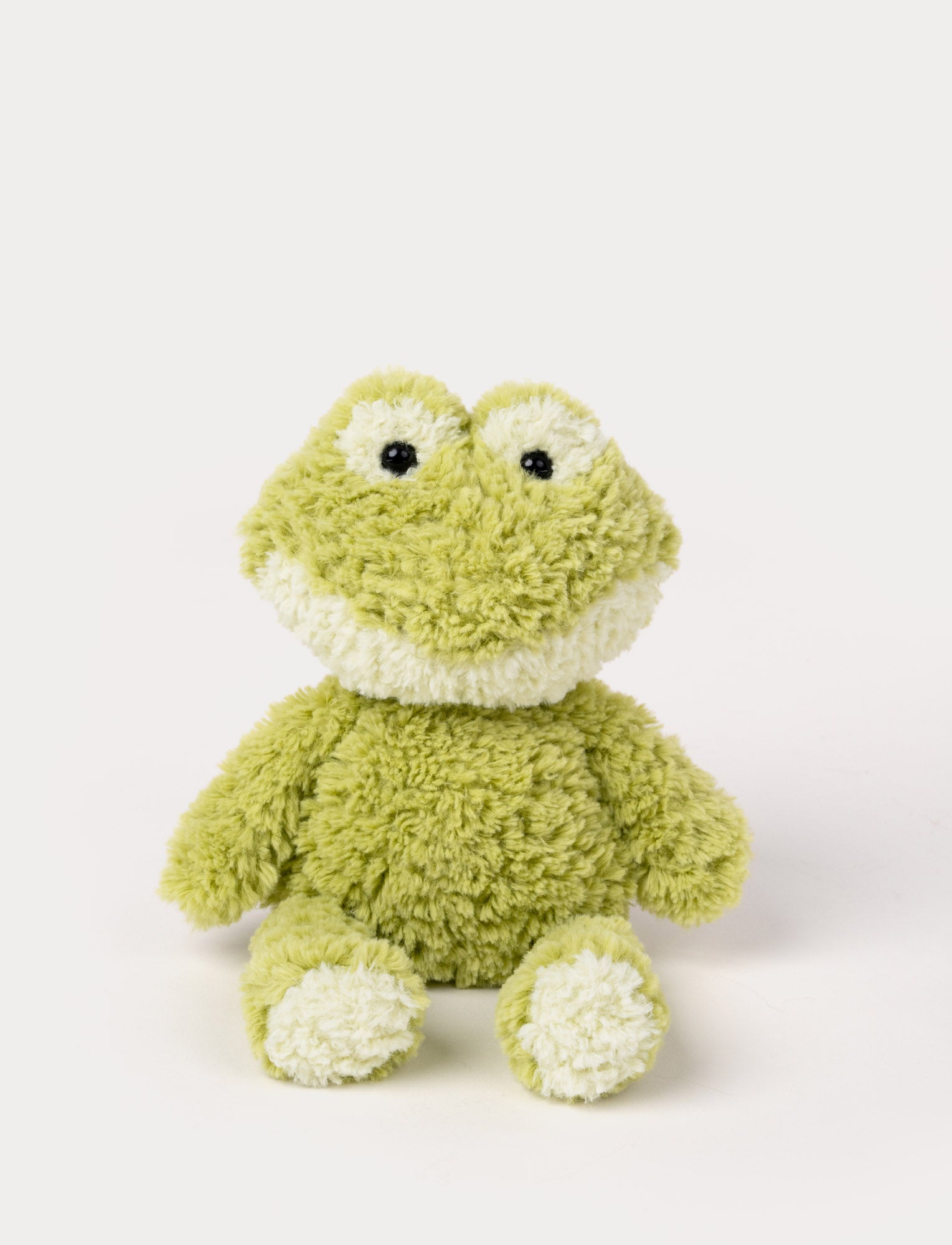  Image of Soft plush frog in light green with a white details, featuring black shiny eyes.