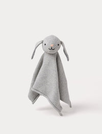 A knitted grey bunny comforter with floppy ears, a stitched face, and a soft textured fabric.