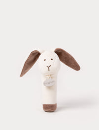 A plush bunny rattle with a soft white body, brown floppy ears, and a stitched face