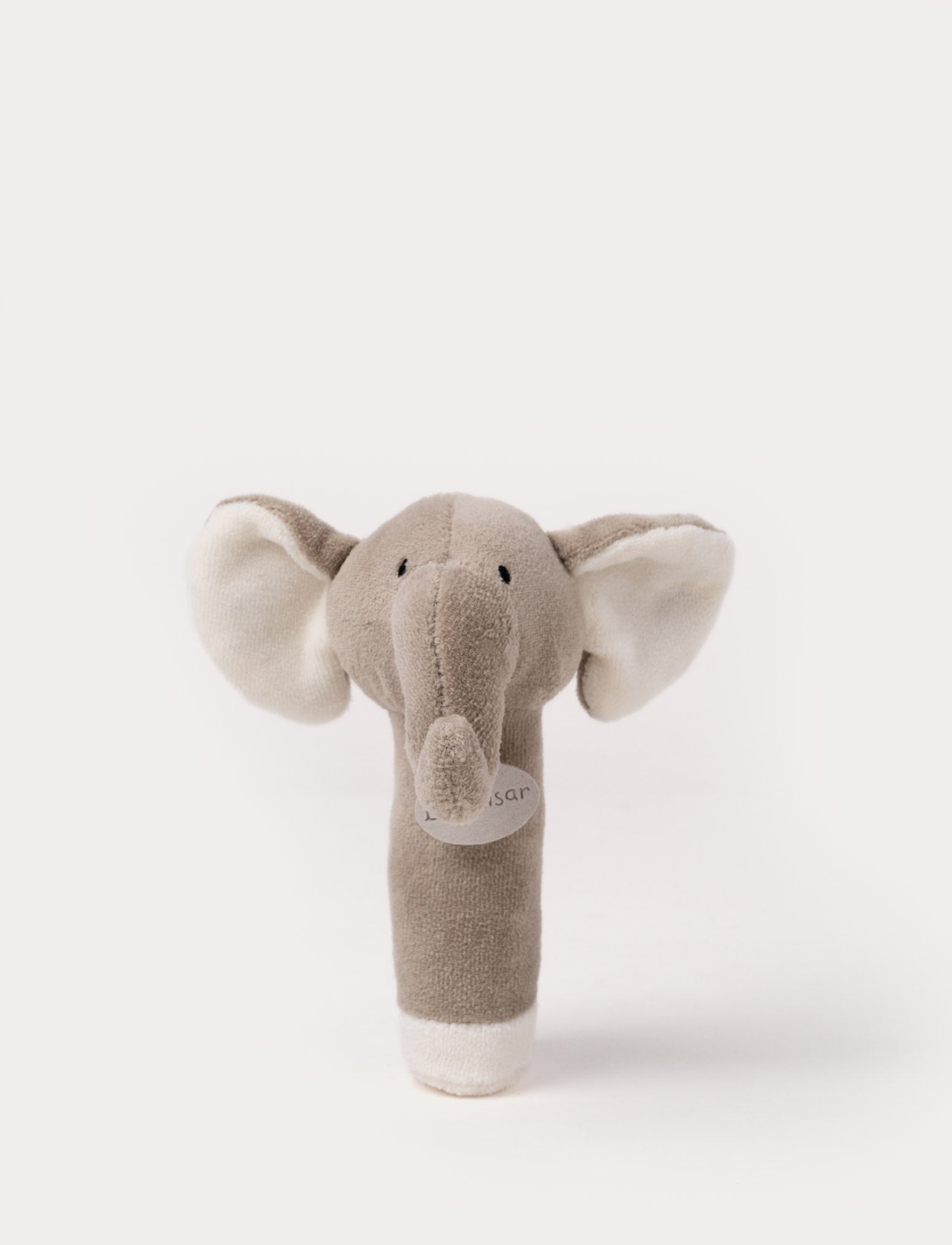  Image of Soft elephant rattle toy in grey with large white ears and a plush trunk.