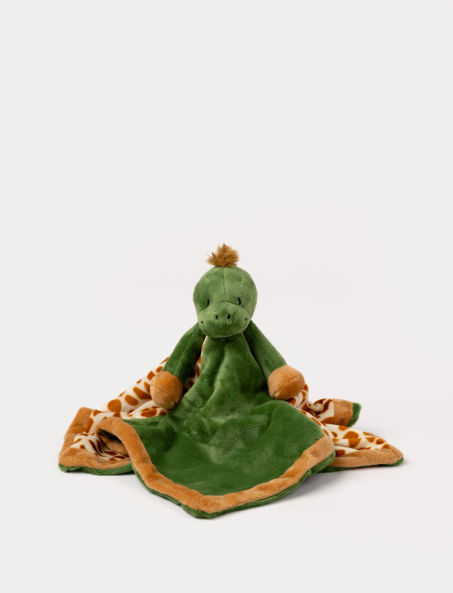 Soft baby blanket with a plush green turtle head, brown hooves, and giraffe-patterned backing.