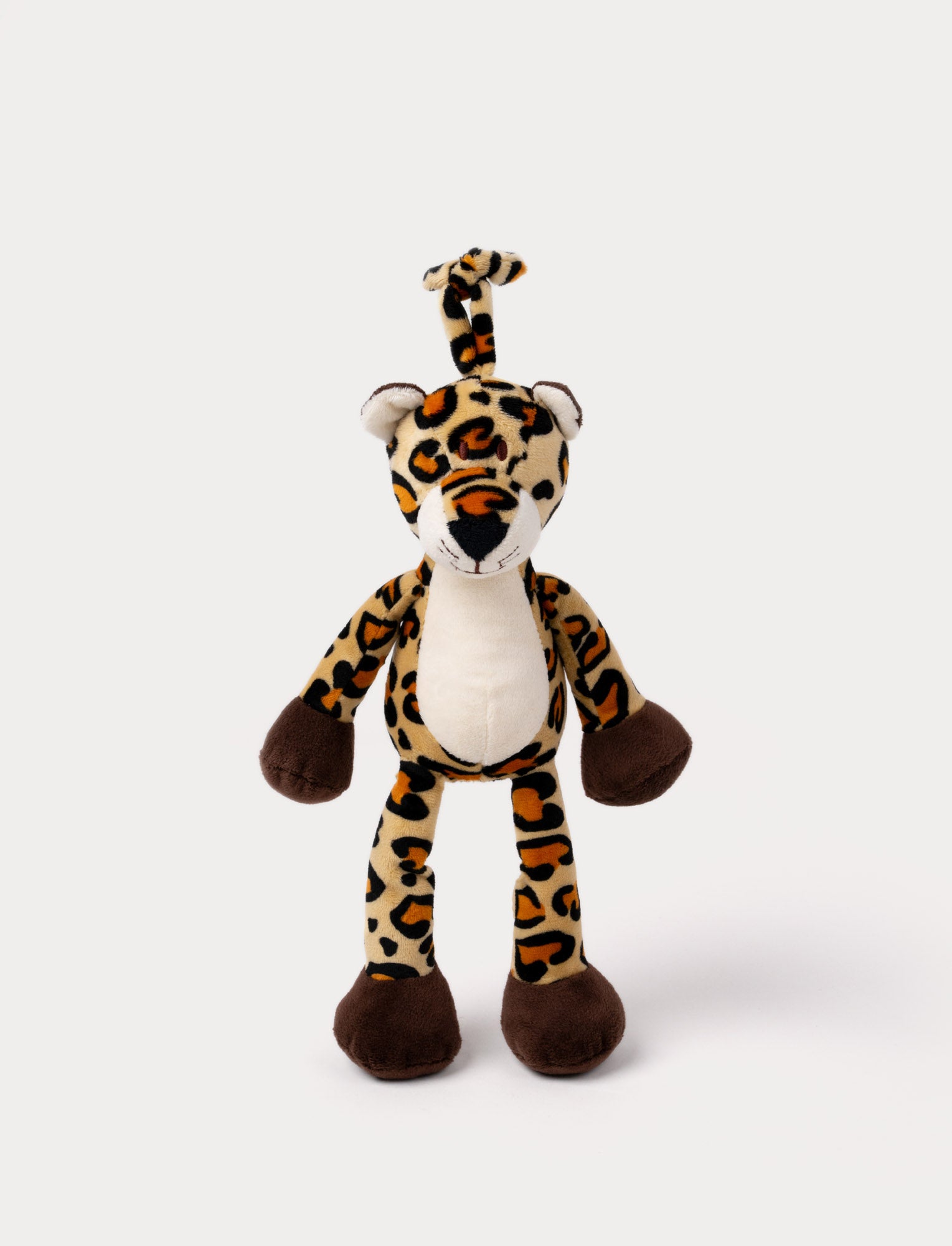  Image of A plush leopard music box with spots, a white belly, brown paws and a hanging loop.