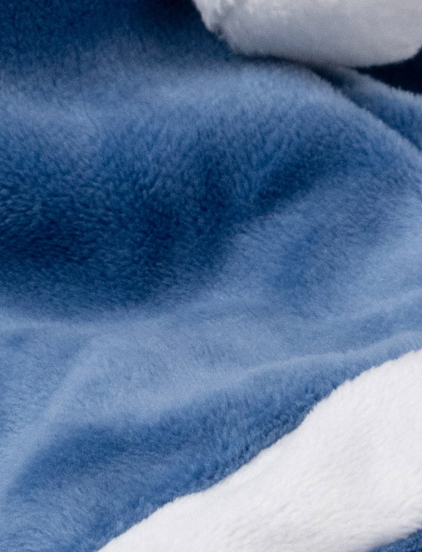Soft baby blanket with a plush blue elephant head, pink ears, and white-trimmed edges.