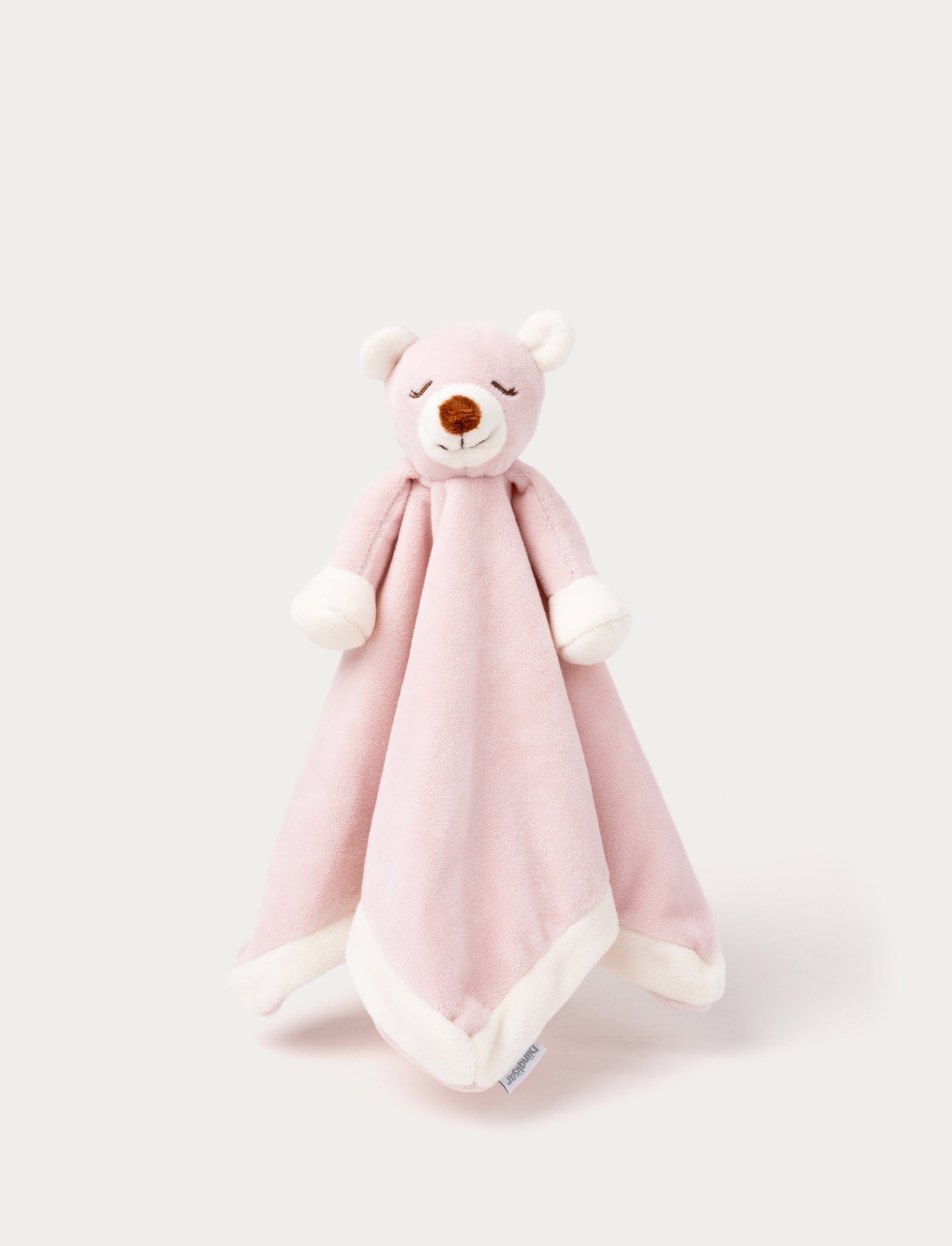  Image of Soft baby blanket with a plush pink bear head, closed eyes, and white-trimmed edges.
