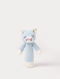 Soft plush cat rattle with a light blue body, embroidered sleeping eyes, a white muzzle, and white accents on the hands and base.