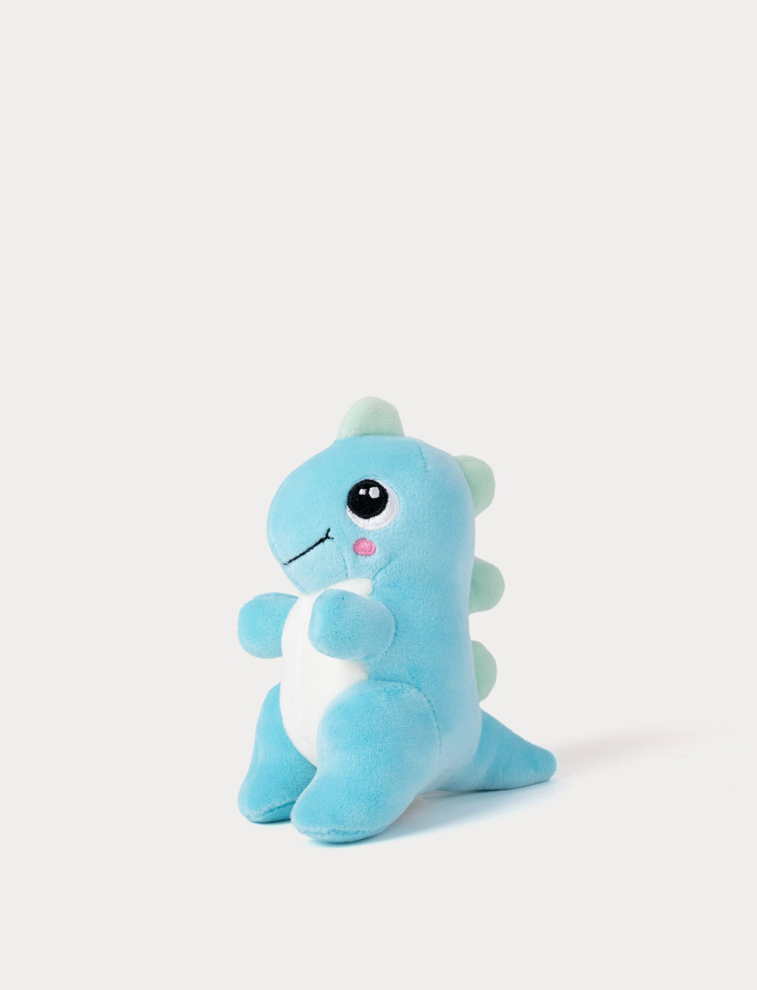  Image of Blue dinosaur plush toy on a white background