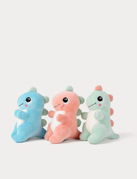 Three colorful dino plush toys on a white background