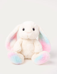 A bunny with cream-colored fur, colorful pastel details on her ears and paws, embroidered eyes.