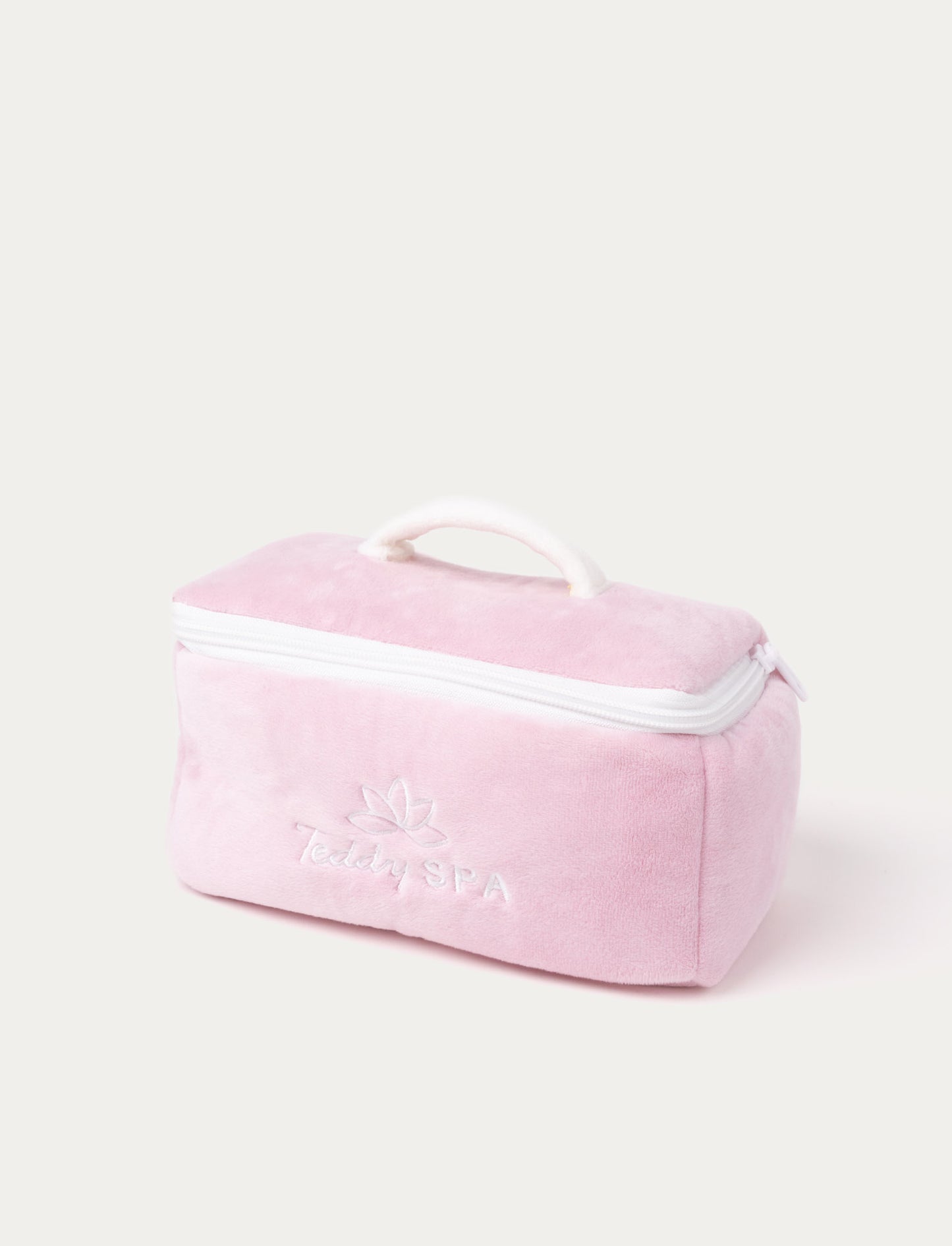 A soft plush spa set with a comb, hairdryer,t, makeup brush, lipstick in a  carry case. Pink & blue