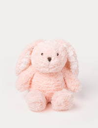 Soft pink bunny plush with floppy ears, fluffy fur, and a stitched nose.