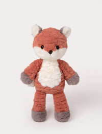 Soft fox plush with a textured orange body, white belly, and gray accents on paws and ears.