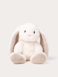 A cream plush bunny with silky-soft fur, faux suede detail on its back, and embroidered eyes.