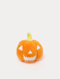 Soft orange pumpkin plush toy with glow-in-the-dark effect. Skeleton design.