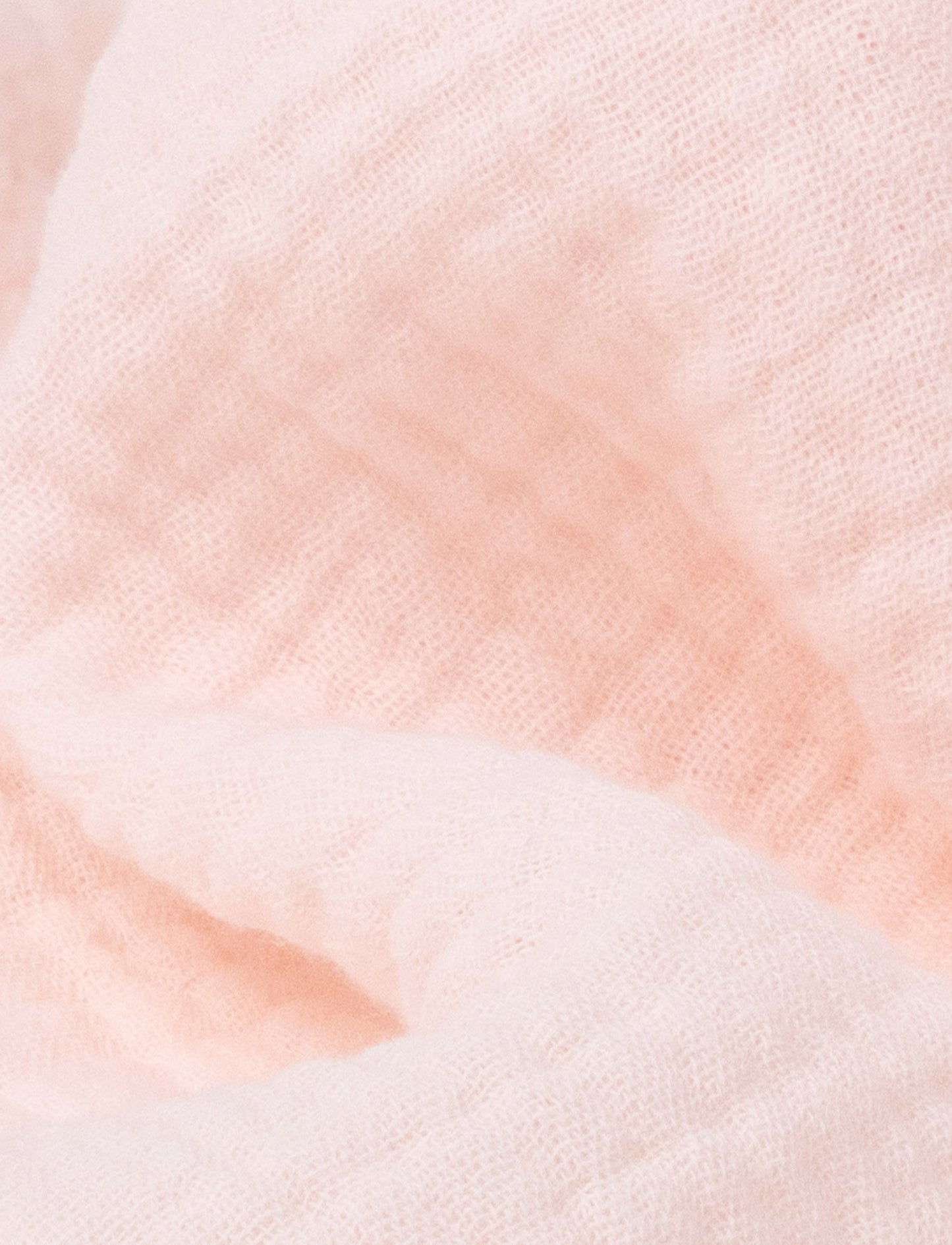 Soft baby blanket with a plush pink bunny head, long floppy ears, and a small bow.