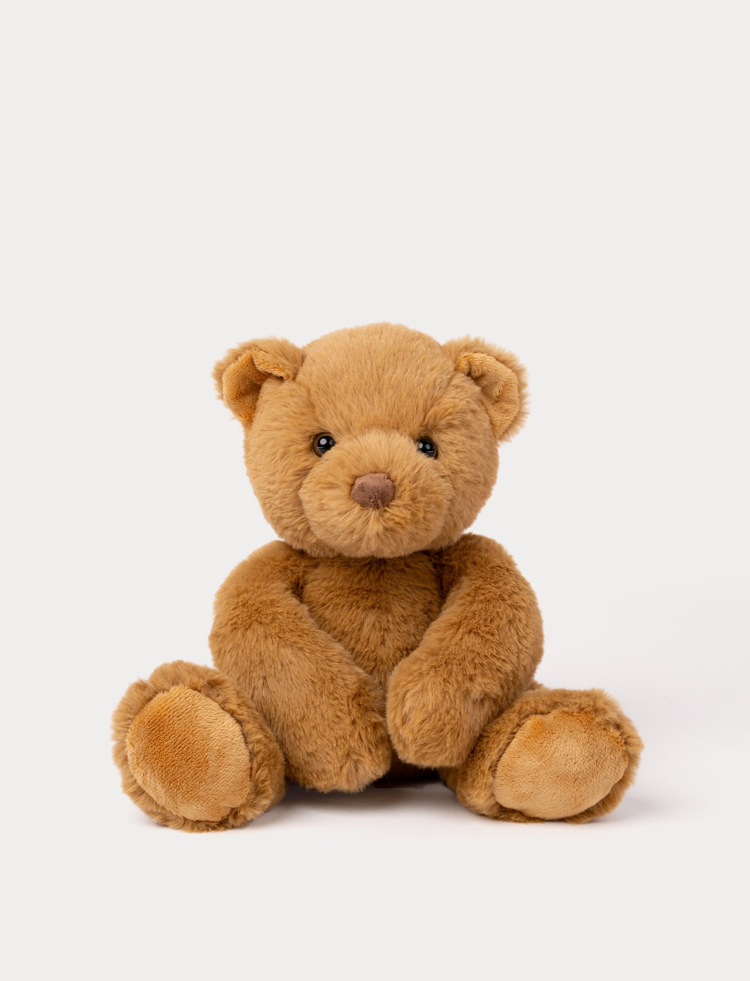  Image of Soft brown teddy bear plush toy sitting with long arms and cute face.